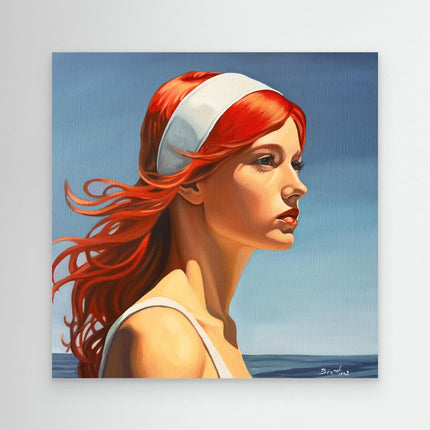 Belle rousse à la plage