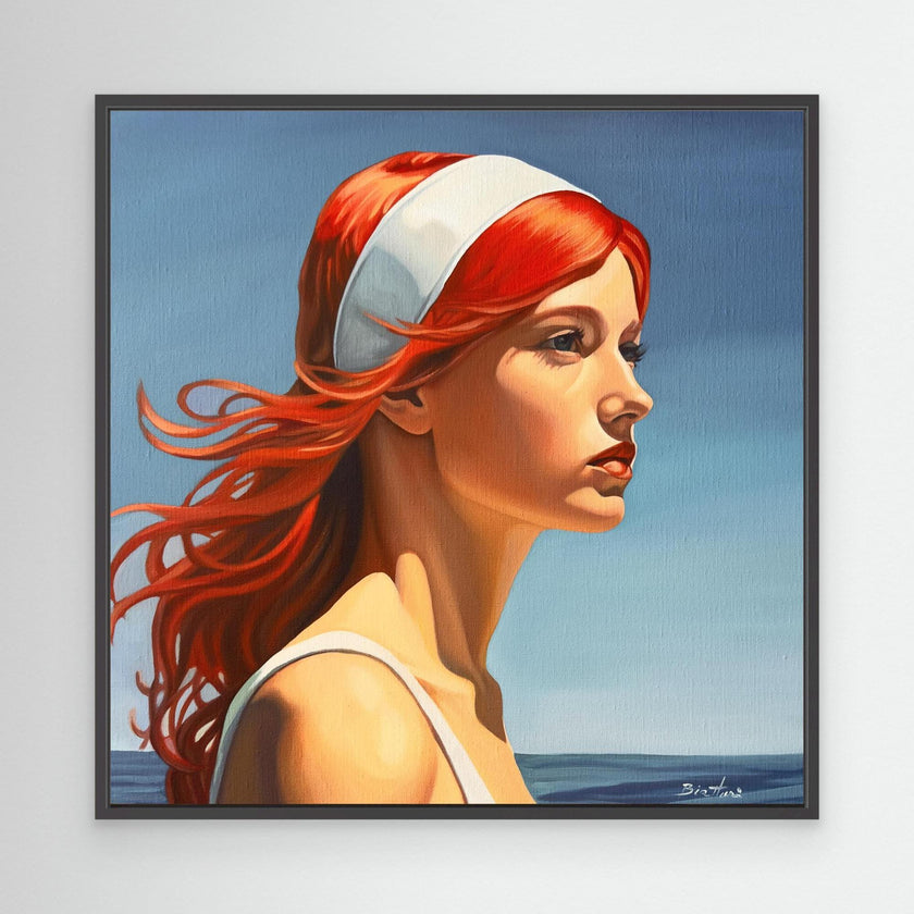 Belle rousse à la plage